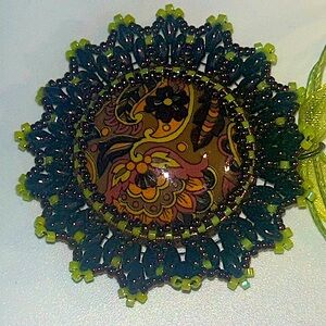 Paisley cabochon pendant beaded necklace handmade brown and lime green ribbon